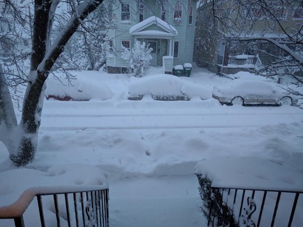 snow-covered front steps of a house